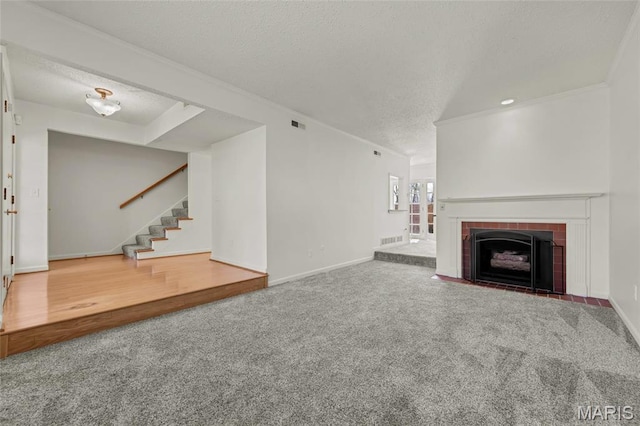13355 Land O Woods Dr, Saint Louis, MO 63141 - unfurnished living room featuring a textured ceiling, stairway, carpet flooring, crown molding, and baseboards