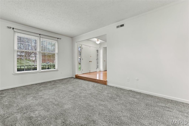 13355 Land O Woods Dr, Saint Louis, MO 63141 - carpeted empty room with a textured ceiling, crown molding, and baseboards