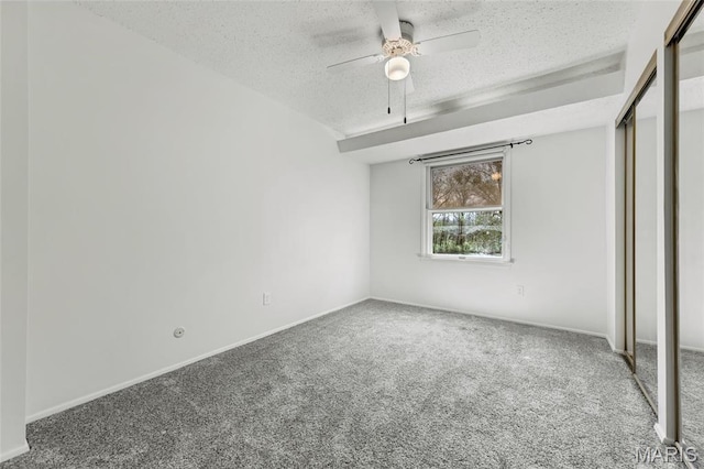 13355 Land O Woods Dr, Saint Louis, MO 63141 - unfurnished bedroom featuring a textured ceiling, carpet floors, baseboards, a ceiling fan, and a closet