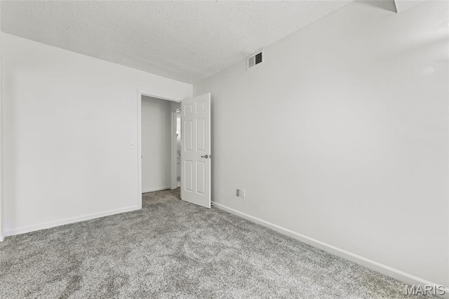 13355 Land O Woods Dr, Saint Louis, MO 63141 - empty room with carpet floors, a textured ceiling, and baseboards