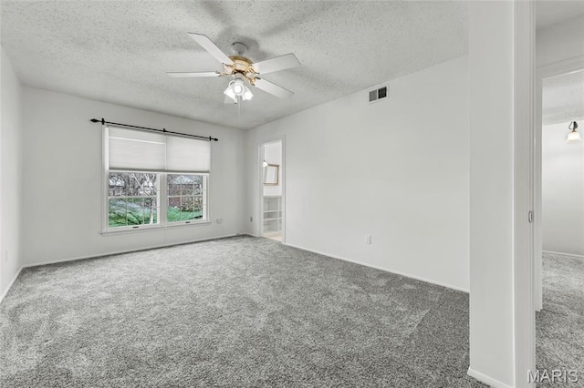 13355 Land O Woods Dr, Saint Louis, MO 63141 - unfurnished room featuring carpet floors, a textured ceiling, a ceiling fan, and baseboards