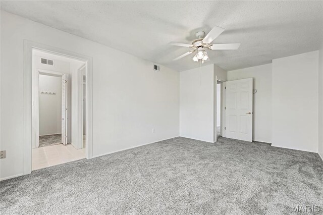 13355 Land O Woods Dr, Saint Louis, MO 63141 - unfurnished bedroom with carpet floors, a textured ceiling, ceiling fan, and baseboards