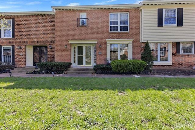 13355 Land O Woods Dr, Saint Louis, MO 63141 - multi unit property featuring a front yard and brick siding