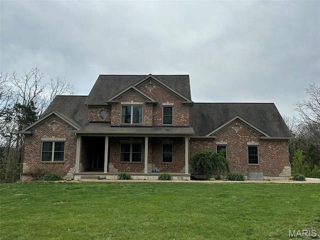 9336 Excelsior Rd, Gerald, MO 63037 - view of front facade with a porch, a front yard, brick siding, and roof with shingles