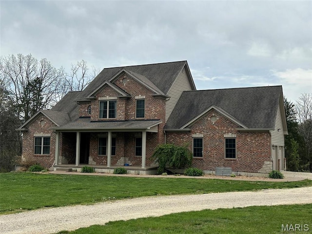 9336 Excelsior Rd, Gerald, MO 63037 - view of front facade featuring brick siding, covered porch, a front yard, and roof with shingles