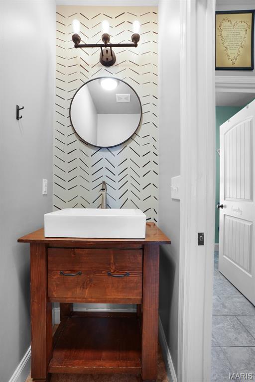 9336 Excelsior Rd, Gerald, MO 63037 - bathroom with baseboards and vanity