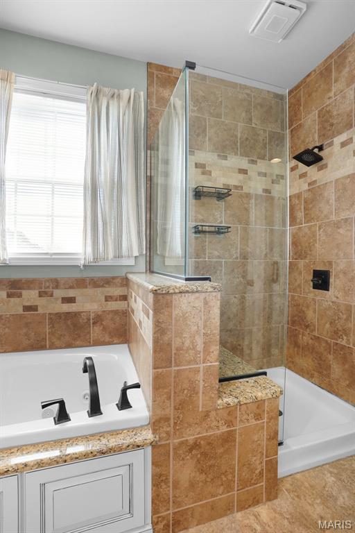 9336 Excelsior Rd, Gerald, MO 63037 - full bath with tiled shower and a bath