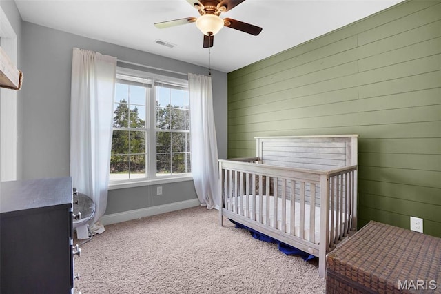 9336 Excelsior Rd, Gerald, MO 63037 - carpeted bedroom featuring baseboards, a nursery area, and ceiling fan