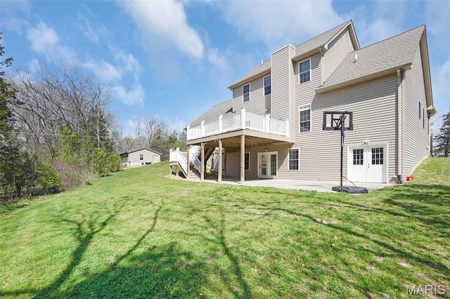 9336 Excelsior Rd, Gerald, MO 63037 - back of property with french doors, a deck, a patio area, and a lawn