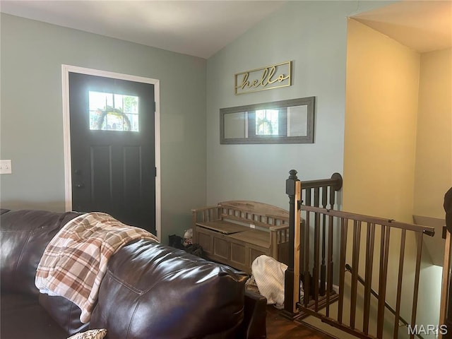 entryway with dark wood finished floors