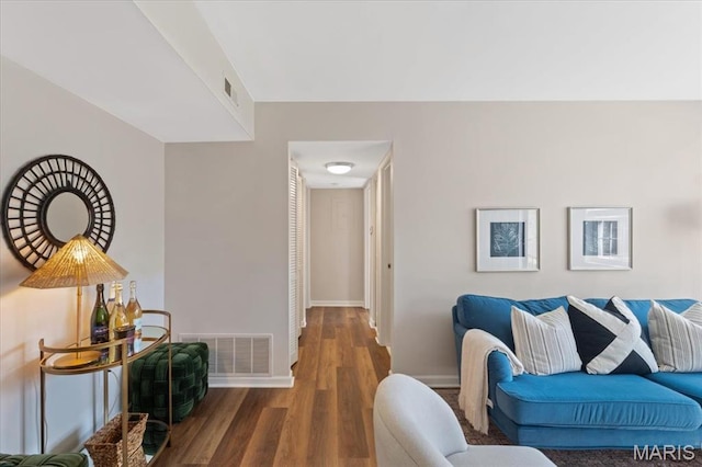 1551 Swallow Dr, Saint Louis, MO 63144 - living room with wood finished floors and baseboards