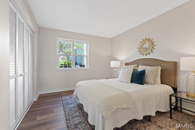1551 Swallow Dr, Saint Louis, MO 63144 - bedroom featuring wood finished floors, baseboards, and a closet
