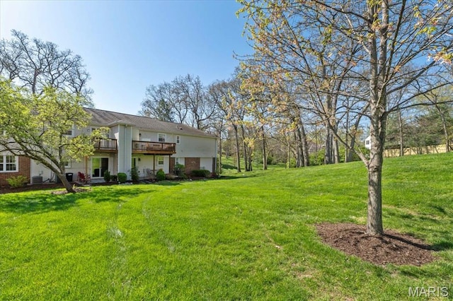 1551 Swallow Dr, Saint Louis, MO 63144 - view of grassy yard featuring a deck