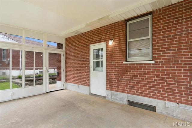 8900 Southview Ln, Saint Louis, MO 63123 - unfurnished sunroom featuring healthy amount of natural light