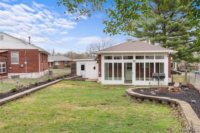 8900 Southview Ln, Saint Louis, MO 63123 - back of house with a shingled roof and a sunroom