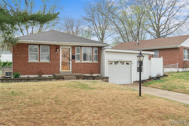 8900 Southview Ln, Saint Louis, MO 63123 - view of front of property with brick siding, a garage, concrete driveway, and entry steps