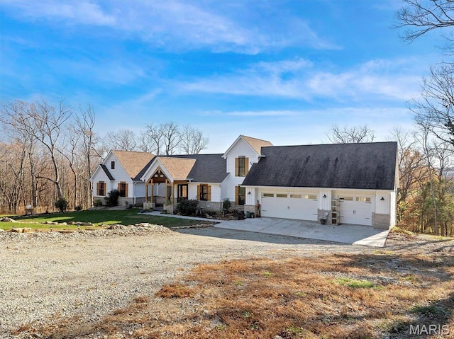 24925 State Route Mm, Farmington, MO 63640 - view of front facade featuring dirt driveway, a garage, and a front lawn