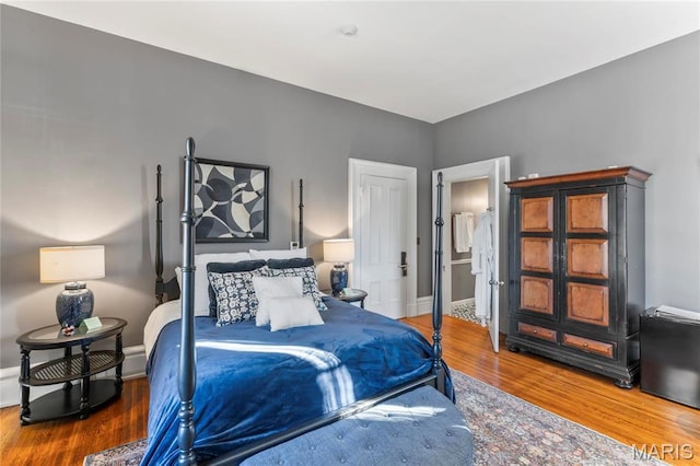 876 W State St W, Jacksonville, IL 62650 - bedroom with wood finished floors and baseboards