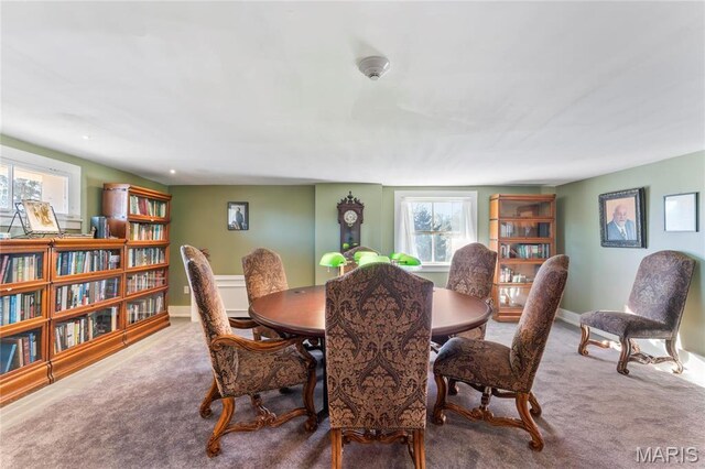 876 W State St W, Jacksonville, IL 62650 - dining area featuring healthy amount of natural light, carpet, and baseboards