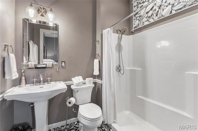 876 W State St W, Jacksonville, IL 62650 - bathroom featuring a shower stall and toilet