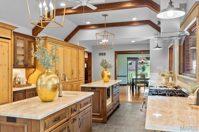 13596 Kings Glen Dr, Saint Louis, MO 63131 - kitchen with a kitchen island, a sink, backsplash, light stone countertops, and brown cabinetry