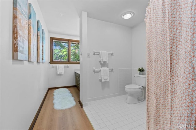 13596 Kings Glen Dr, Saint Louis, MO 63131 - bathroom with vanity, toilet, and wood finished floors