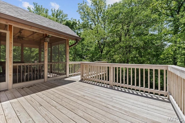 13596 Kings Glen Dr, Saint Louis, MO 63131 - wooden deck featuring a sunroom, view of scattered trees, and ceiling fan
