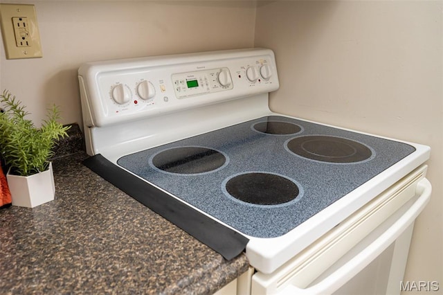 2917 Grand Ave, Granite City, IL 62040 - kitchen view of white range with electric cooktop and dark countertops