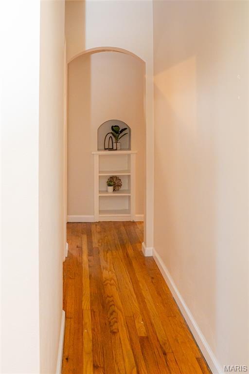 2917 Grand Ave, Granite City, IL 62040 - hall featuring wood finished floors and arched walkways