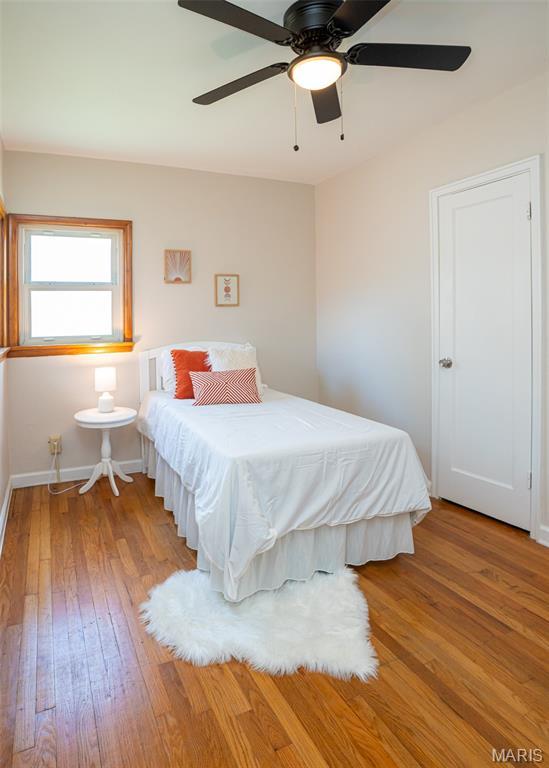 2917 Grand Ave, Granite City, IL 62040 - bedroom featuring wood-type flooring and a ceiling fan