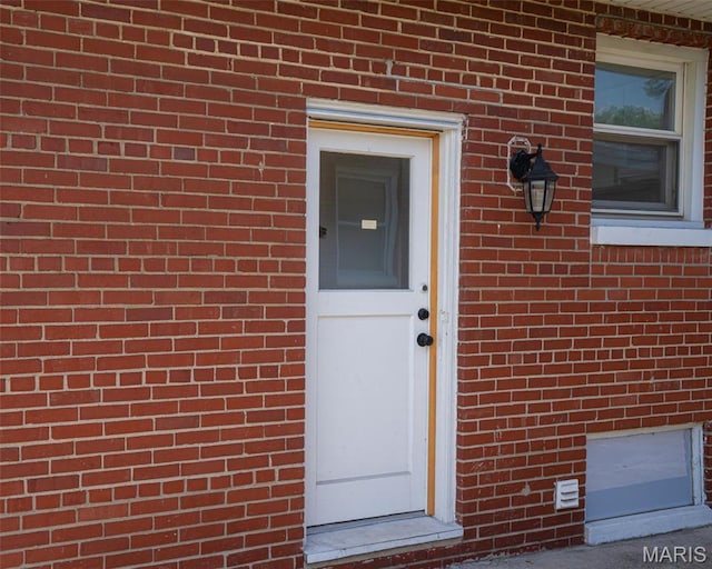 2917 Grand Ave, Granite City, IL 62040 - doorway to property featuring brick siding