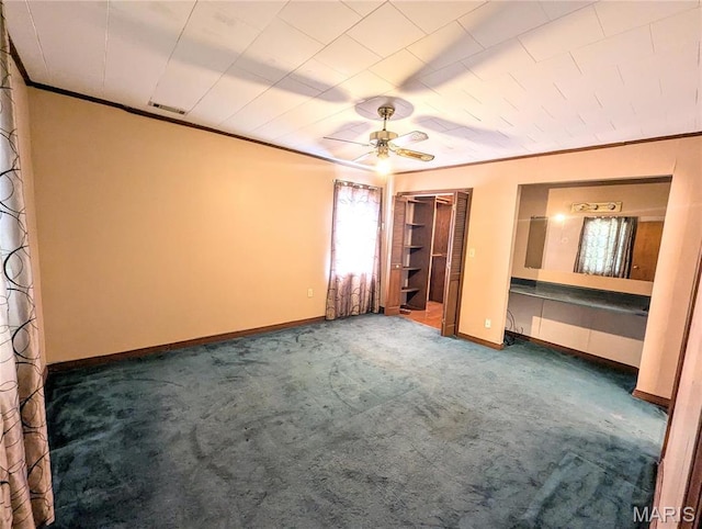 303 N Main St, Campbell, MO 63933 - unfurnished bedroom featuring carpet, crown molding, baseboards, and ceiling fan