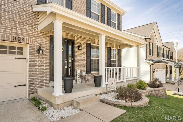 1168 Oak Hollow Dr, Imperial, MO 63052 - view of exterior entry with a porch and brick siding