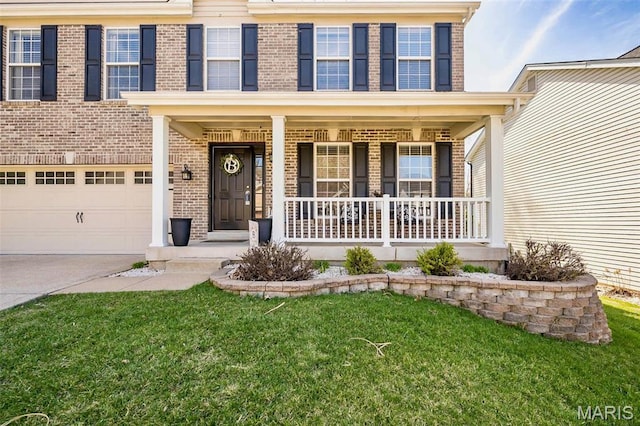1168 Oak Hollow Dr, Imperial, MO 63052 - view of front of house with brick siding, a porch, driveway, an attached garage, and a front lawn