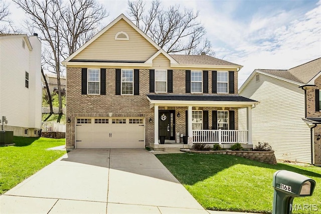 1168 Oak Hollow Dr, Imperial, MO 63052 - traditional-style home featuring covered porch, concrete driveway, an attached garage, and brick siding