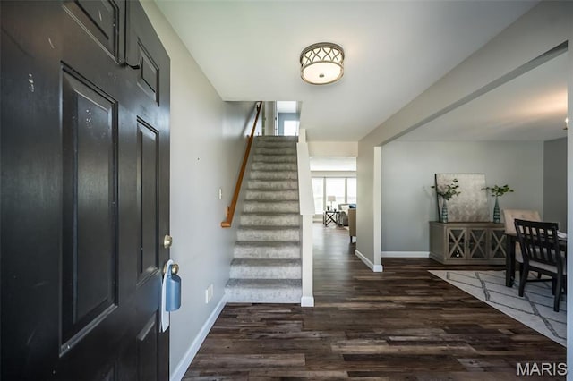 1168 Oak Hollow Dr, Imperial, MO 63052 - entryway featuring dark wood-type flooring, baseboards, and stairs