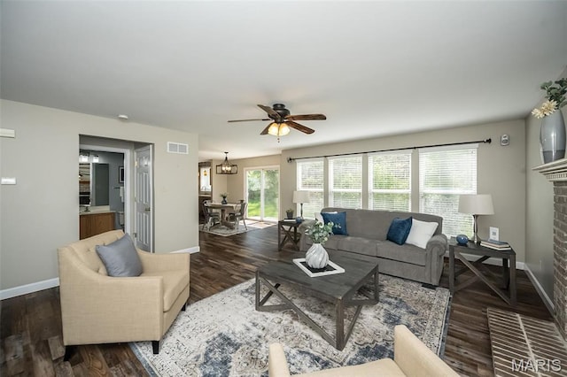 1168 Oak Hollow Dr, Imperial, MO 63052 - living area with a ceiling fan, baseboards, wood finished floors, and a fireplace