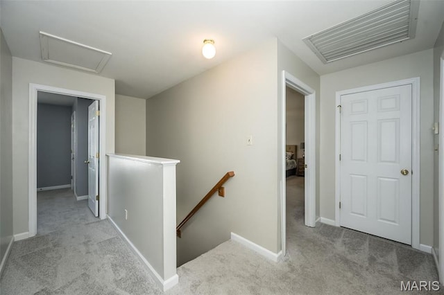 1168 Oak Hollow Dr, Imperial, MO 63052 - corridor with an upstairs landing, carpet floors, attic access, and baseboards