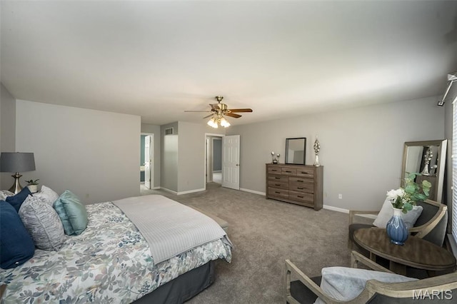 1168 Oak Hollow Dr, Imperial, MO 63052 - carpeted bedroom with a ceiling fan and baseboards
