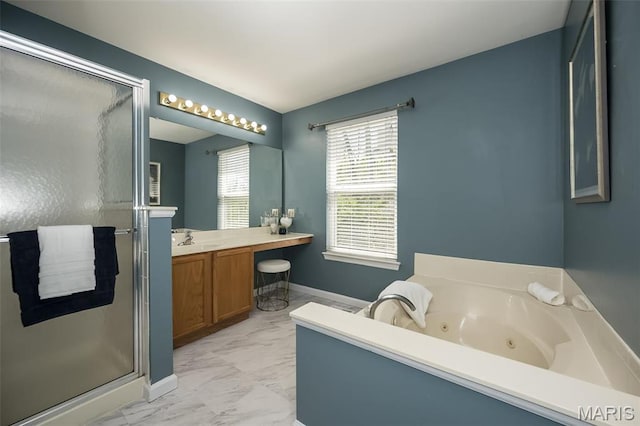 1168 Oak Hollow Dr, Imperial, MO 63052 - bathroom with a stall shower, marble look tiles, a jetted tub, vanity, and baseboards