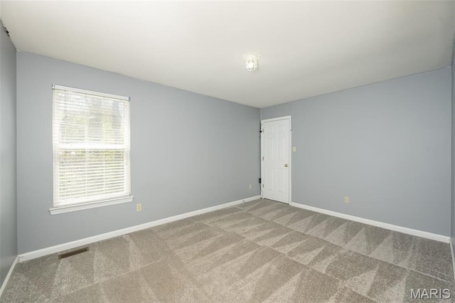 1168 Oak Hollow Dr, Imperial, MO 63052 - carpeted empty room with baseboards