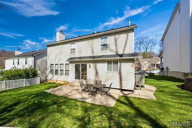 1168 Oak Hollow Dr, Imperial, MO 63052 - back of house with a chimney and a patio