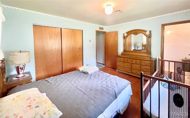 5815 Robin Ln, Troy, MO 63379 - bedroom with wood finished floors and a closet