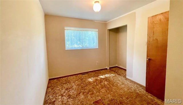 5815 Robin Ln, Troy, MO 63379 - unfurnished bedroom featuring carpet and baseboards