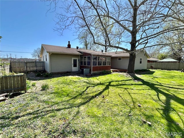 1101 S Mildred Blvd, Salem, MO 65560 - back of house with a sunroom, a chimney, and central air condition unit