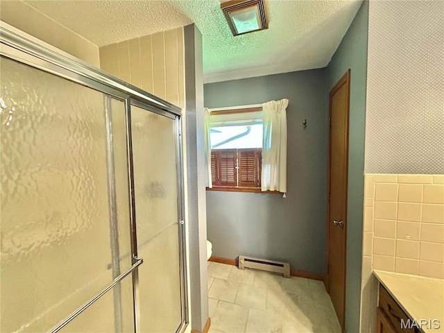 1101 S Mildred Blvd, Salem, MO 65560 - bathroom featuring baseboard heating, a shower stall, a textured ceiling, baseboards, and toilet