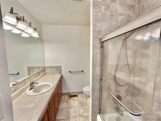 1101 S Mildred Blvd, Salem, MO 65560 - full bath featuring a shower with door, toilet, vanity, and baseboards