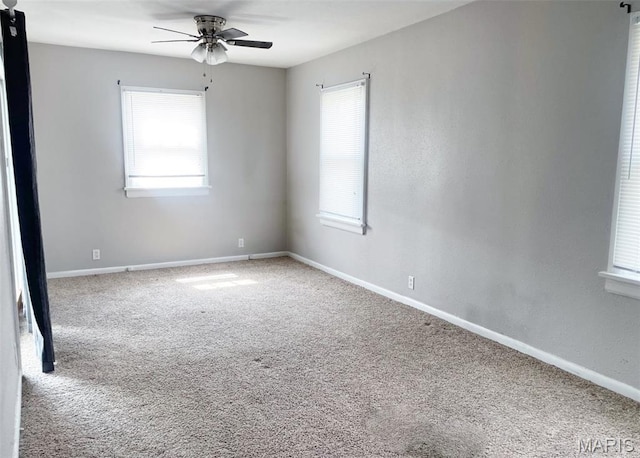 109 N Oak St, Rolla, MO 65401 - carpeted spare room with a ceiling fan and baseboards