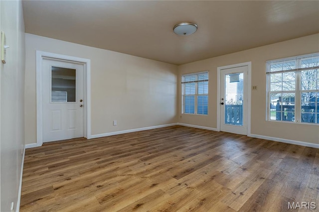 2938 Oregon Ave, Granite City, IL 62040 - empty room with wood finished floors and baseboards