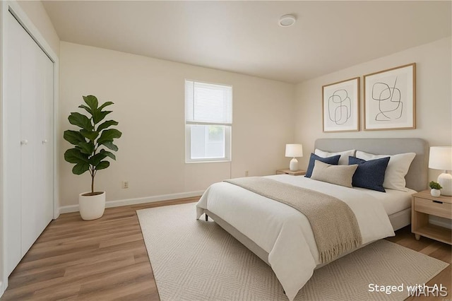 2938 Oregon Ave, Granite City, IL 62040 - bedroom with wood finished floors and a closet